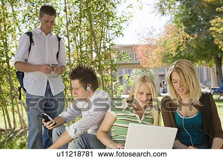 Young students having a break View Large Photo Image Stock Image - Young students having a break. Fotosearch