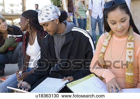 Young students waiting classes View Large Photo Image Stock Image - Young students waiting classes. Fotosearch