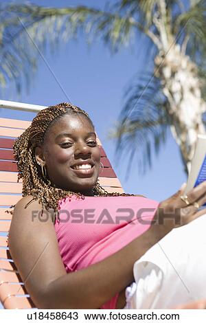 Young Woman Relaxing on Vacation View Large Photo Image Stock Image - Young Woman Relaxing on Vacation. Fotosearch