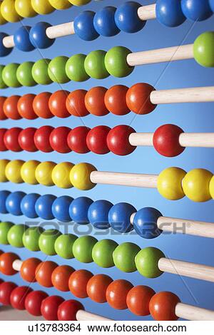 Abacus, close up of rows of beads View Large Photo Image Picture - Abacus, close up of rows of beads. Fotosearch
