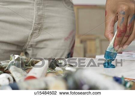 Artist Squeezing Paint onto Palette View Large Photo Image Stock Image - Artist Squeezing Paint onto Palette. Fotosearch