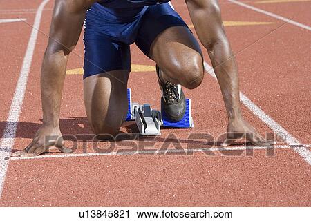 Athlete ready to run View Large Photo Image Stock Image - Athlete ready to run. Fotosearch