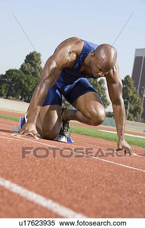 Athlete ready to run View Large Photo Image Stock Photography - Athlete ready to run. Fotosearch