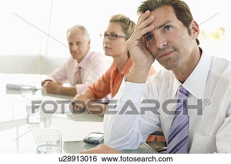 Business colleagues in conference meeting View Large Photo Image Stock Photograph - Business colleagues in conference meeting. Fotosearch