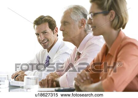 Stock Photography - Business colleagues in conference meeting. Fotosearch