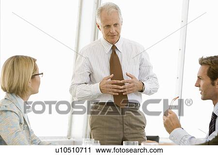 Business meeting in conference room View Large Photo Image Stock Image - Business meeting in conference room. Fotosearch