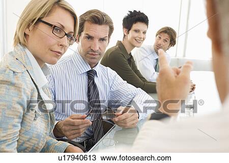 Stock Image - Business meeting in conference room. Fotosearch