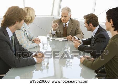 Stock Photograph - Business meeting in conference room. Fotosearch