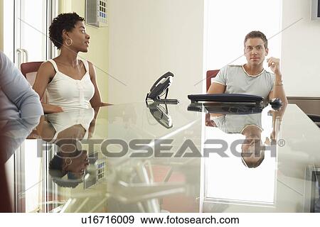 Stock Photo - Business people in conference meeting. Fotosearch