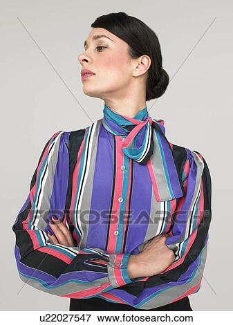 Business woman with arms crossed in Studio View Large Photo Image Stock Photo - Business woman with arms crossed in Studio. Fotosearch