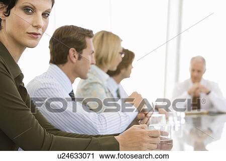 Business woman with colleagues in conference meeting View Large Photo Image Stock Image - Business woman with colleagues in conference meeting. Fotosearch