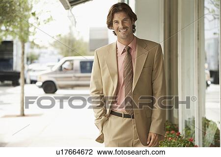 Businessman in street, portrait View Large Photo Image Stock Image - Businessman in street, portrait. Fotosearch