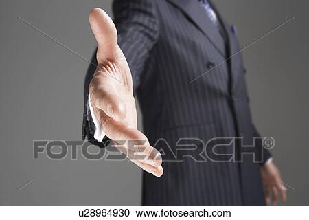 Businessman Offering Hand, mid-section View Large Photo Image Stock Image - Businessman Offering Hand, mid-section. Fotosearch