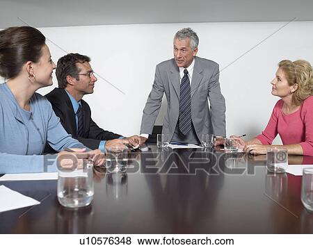 Businesspeople in conference meeting View Large Photo Image Stock Photo - Businesspeople in conference meeting. Fotosearch