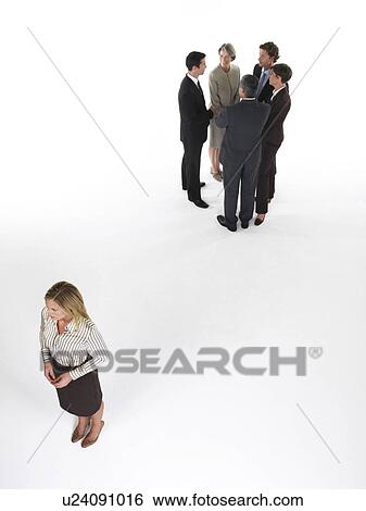 Stock Photograph - Businesswoman Feeling Left Out. Fotosearch