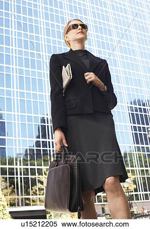 Businesswoman outside office building View Large Photo Image Stock Photography - Businesswoman outside office building. Fotosearch