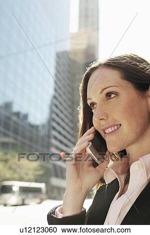 Stock Image - Businesswoman Phoning. Fotosearch