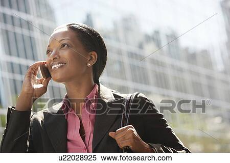 Stock Photography - Businesswoman Phoning. Fotosearch