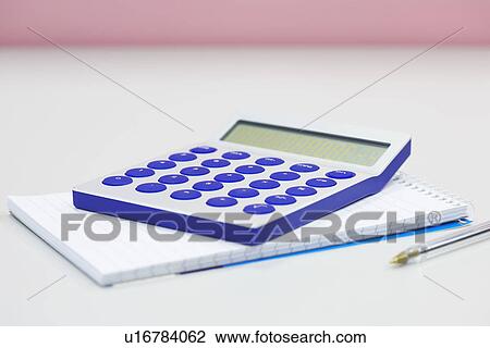 Calculator notebook and pen on table, close up View Large Photo Image Stock Image - Calculator notebook and pen on table, close up. Fotosearch