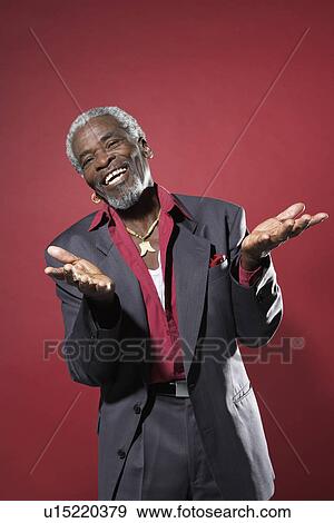 Stock Photo - Cheerful Man with Hands Outstretched. Fotosearch