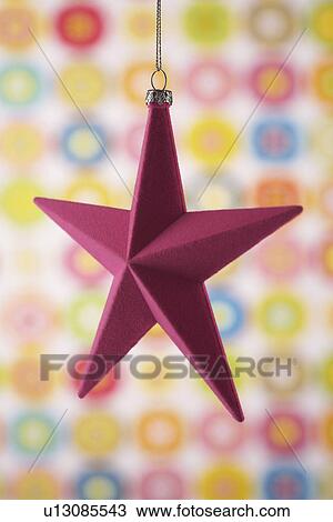 Stock Image - Christmas star ornament, close-up. Fotosearch