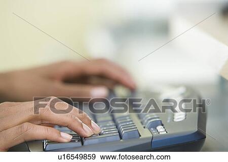 Close-up view of women's hands on computer keyboard View Large Photo Image Stock Photo - Close-up view of women's hands on computer keyboard. Fotosearch