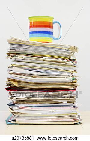 Coffee Mug on Stack of Files View Large Photo Image Stock Image - Coffee Mug on Stack of Files. Fotosearch