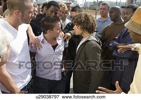 Stock Photo - Conflict among crowd . Fotosearch