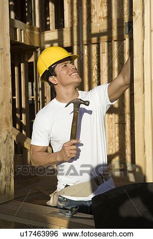 Construction worker on site View Large Photo Image Stock Photograph - Construction worker on site. Fotosearch