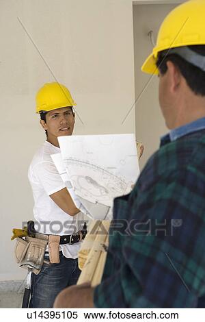 Construction Workers at work View Large Photo Image Stock Photography - Construction Workers at work. Fotosearch