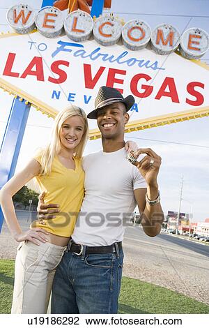 Couple having fun in Las Vegas, Nevada, USA View Large Photo Image Stock Image - Couple having fun in Las Vegas, Nevada, USA. Fotosearch
