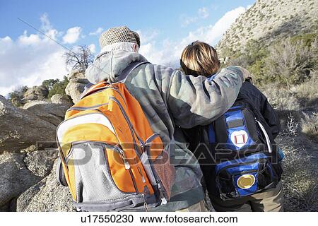 Couple hiking in desert View Large Photo Image Stock Image - Couple hiking in desert. Fotosearch