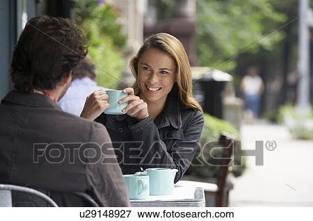 Couple in Cafe View Large Photo Image Stock Photo - Couple in Cafe. Fotosearch