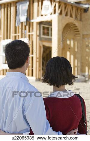 Couple in construction site View Large Photo Image Stock Photography - Couple in construction site. Fotosearch