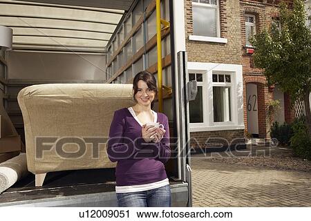 Couple Moving into New Home View Large Photo Image Stock Image - Couple Moving into New Home. Fotosearch
