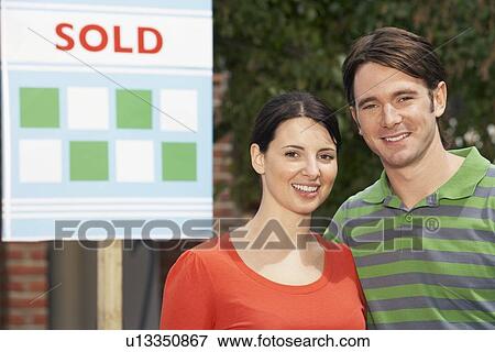 Couple Moving into New Home View Large Photo Image Stock Photo - Couple Moving into New Home. Fotosearch