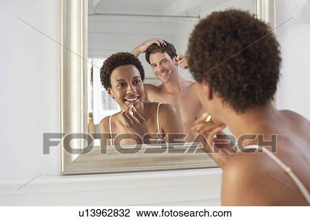 Couple Using Bathroom Mirror View Large Photo Image Stock Image - Couple Using Bathroom Mirror. Fotosearch