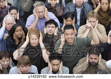 Crowd covering ears View Large Photo Image Stock Image - Crowd covering ears. Fotosearch
