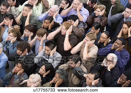 Crowd covering ears View Large Photo Image Stock Image - Crowd covering ears. Fotosearch