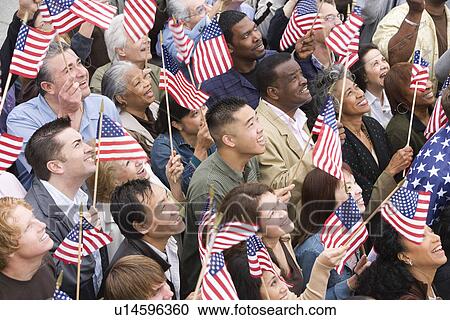 Crowd holding American flags View Large Photo Image Stock Image - Crowd holding American flags. Fotosearch