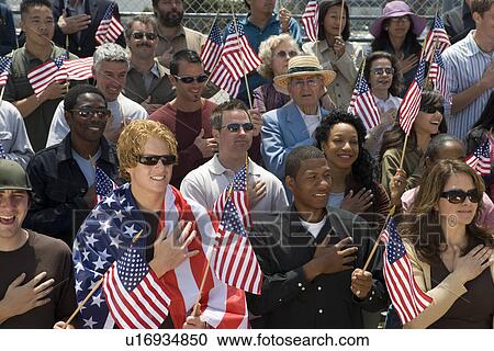 Crowd holding American flags View Large Photo Image Stock Image - Crowd holding American flags. Fotosearch