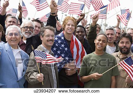 Crowd holding American flags View Large Photo Image Stock Photo - Crowd holding American flags. Fotosearch