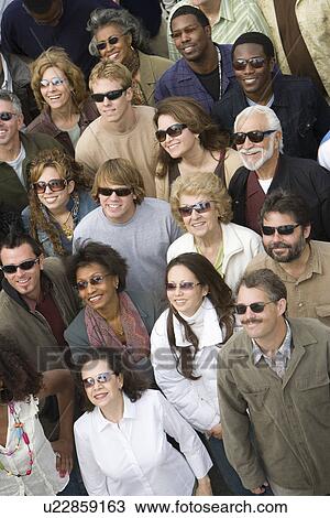 Crowd wearing sunglasses View Large Photo Image Stock Image - Crowd wearing sunglasses. Fotosearch