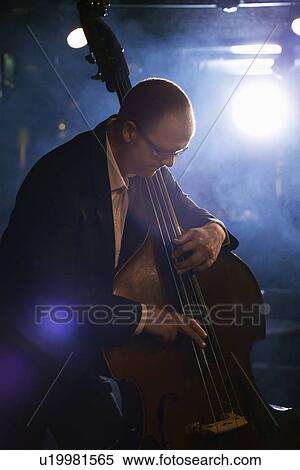 Double Bass Player in Jazz Club View Large Photo Image Stock Photography - Double Bass Player in Jazz Club. Fotosearch