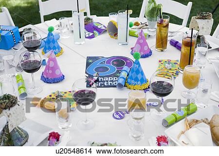 Elevated view of table prepared for birthday party View Large Photo Image Picture - Elevated view of table prepared for birthday party. Fotosearch