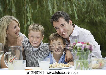 Family Having Picnic in Park View Large Photo Image Stock Photograph - Family Having Picnic in Park. Fotosearch