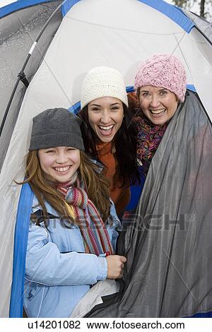 Family in entrance to tent, portrait View Large Photo Image Stock Image - Family in entrance to tent, portrait. Fotosearch