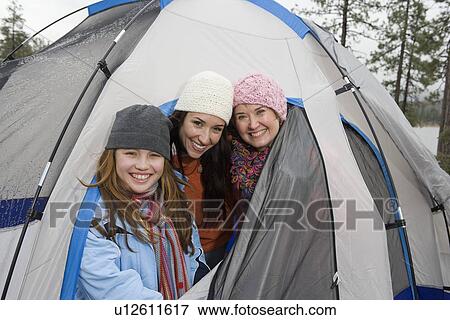 Family in entrance to tent, portrait View Large Photo Image Stock Photo - Family in entrance to tent, portrait. Fotosearch