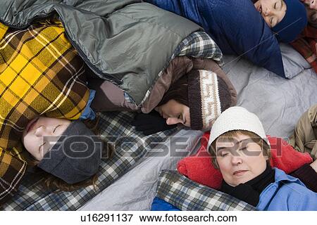 Family sleeping in tent View Large Photo Image Stock Photo - Family sleeping in tent. Fotosearch