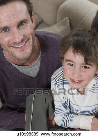 Father and Son on Sofa View Large Photo Image Stock Photo - Father and Son on Sofa. Fotosearch